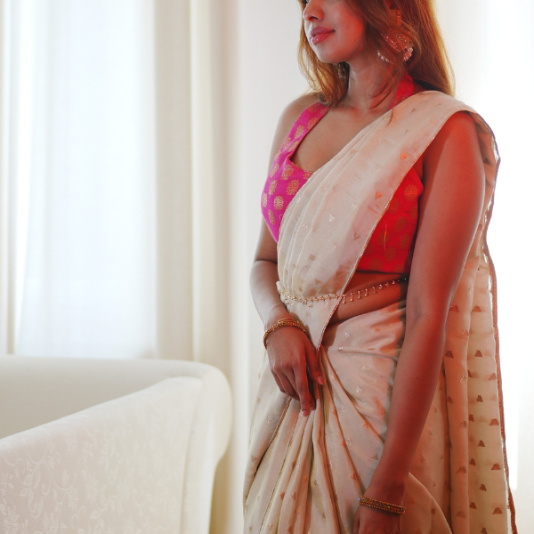 Onam Golden Saree with triangular Buttas