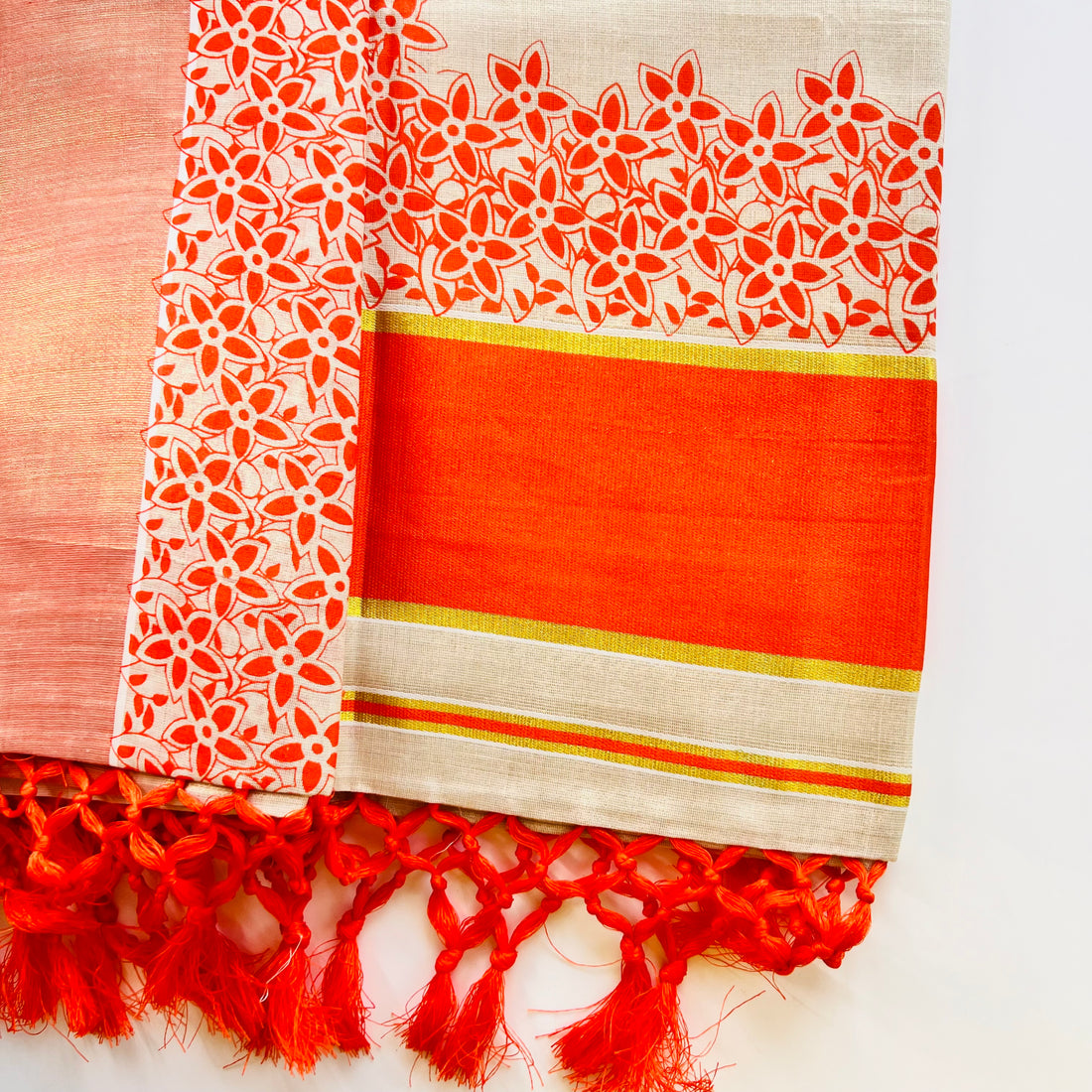 Netra Kerala Saree Golden and Orange Border flower handprints