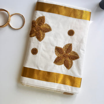 Raga Kerala Saree with golden flower embroidery