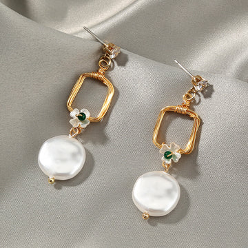 Auga Baroque pearl earrings