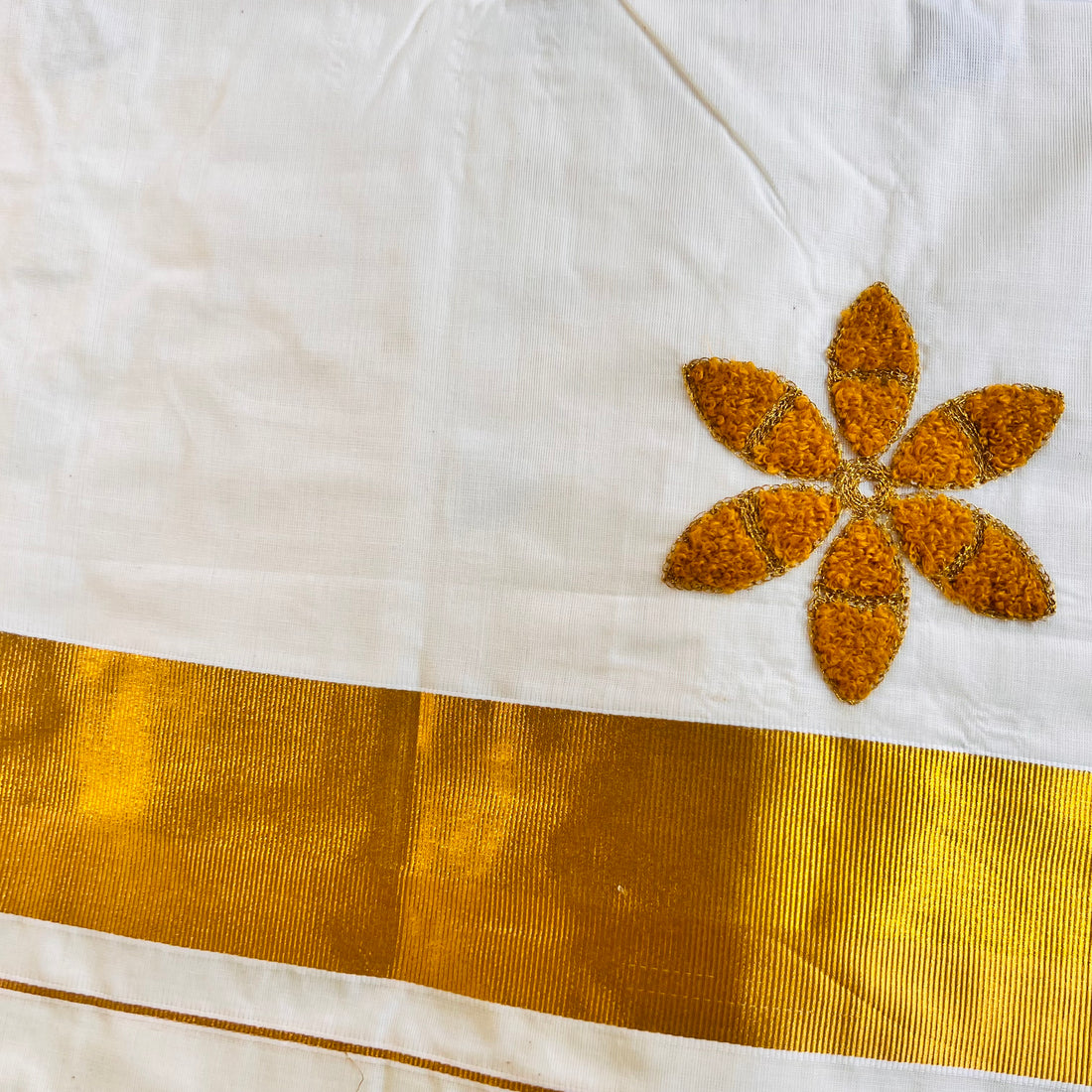 Raga Kerala Saree with golden flower embroidery