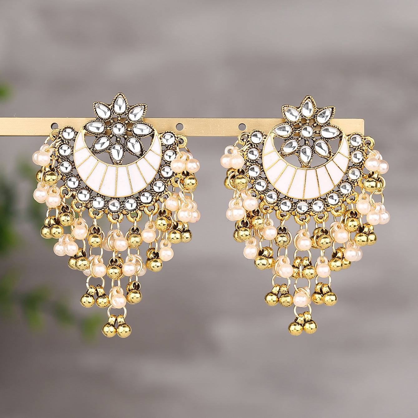 Nilan Indian Hollow Bell Dripping Earrings
