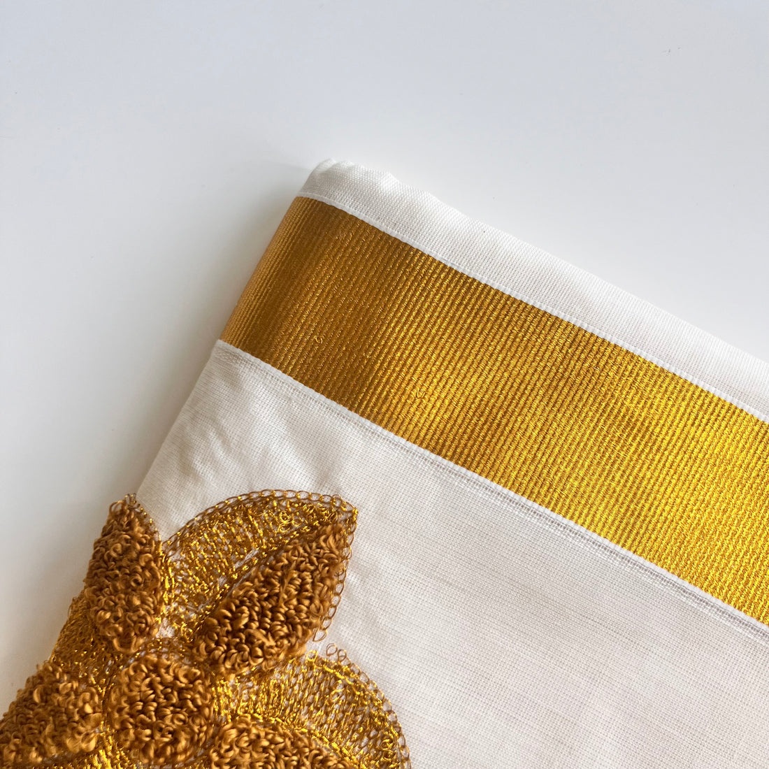 Raga Kerala Saree with golden flower embroidery